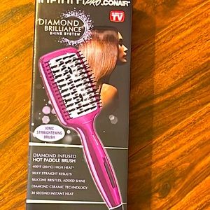Electric Hair Brush by  Conair